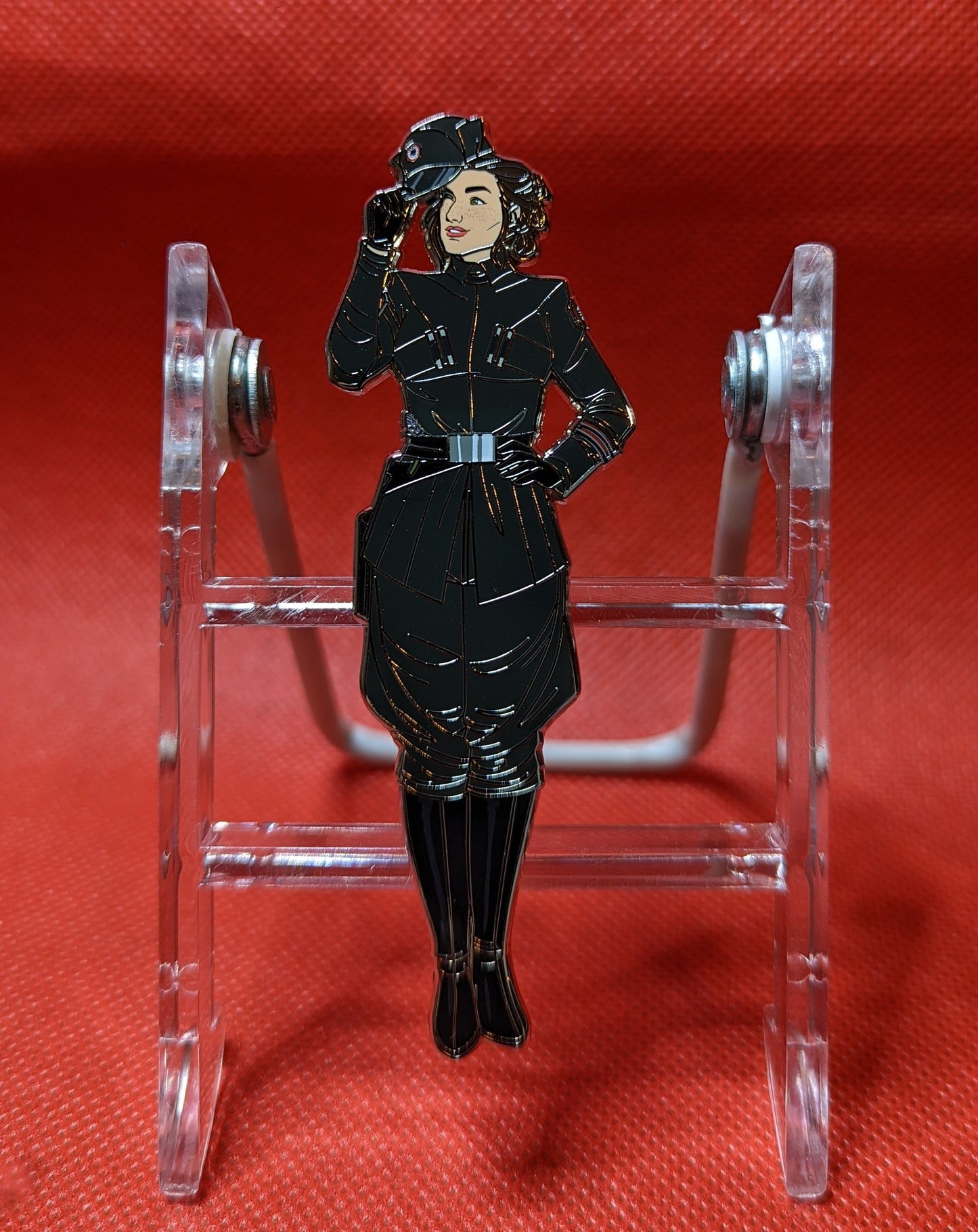 Our favorite scavenger in a full FO officer outfit, tipping her hat. Pin is 3.75 inches tall.